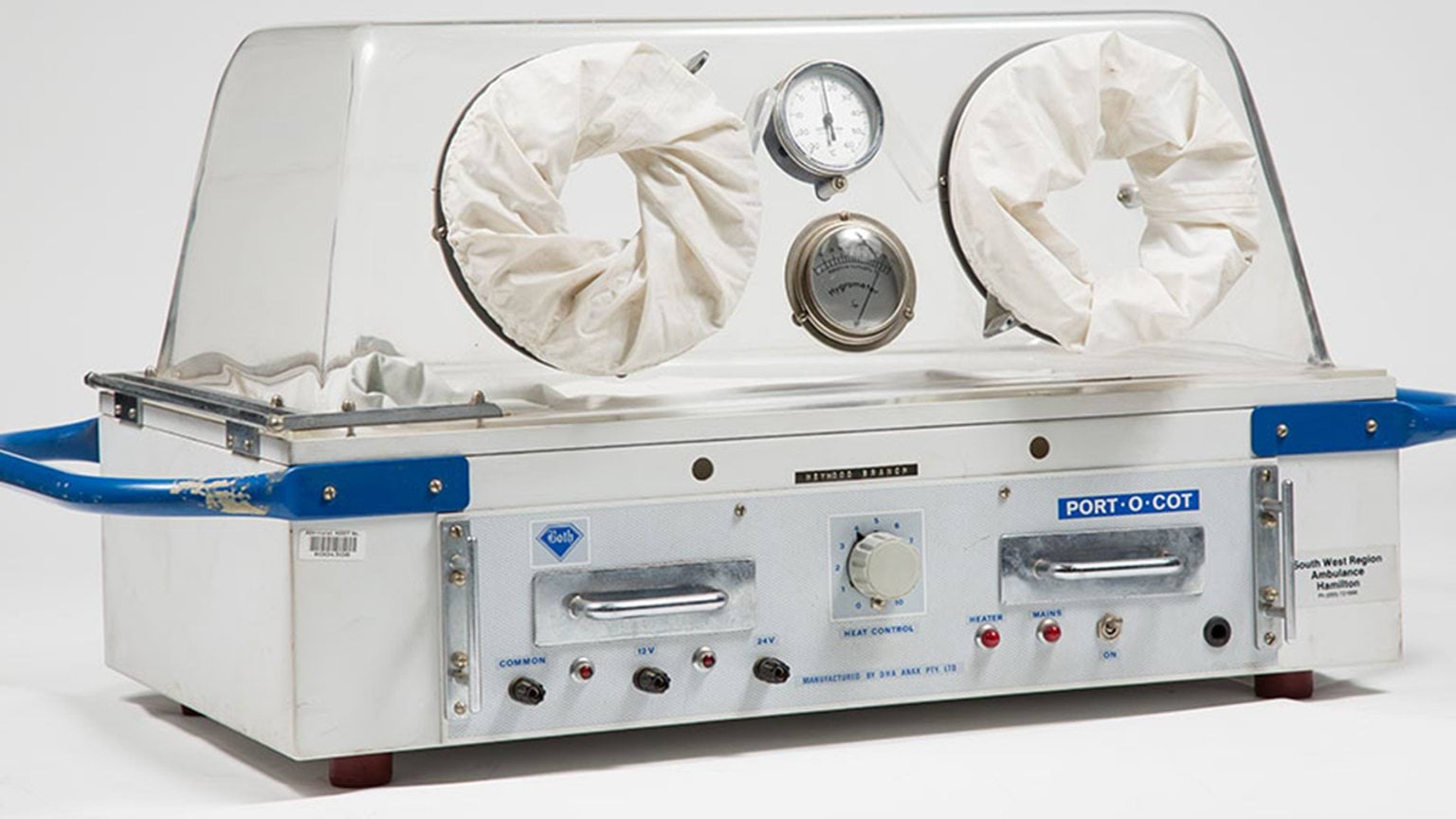 A medical device featuring two large holes for hand insertion.