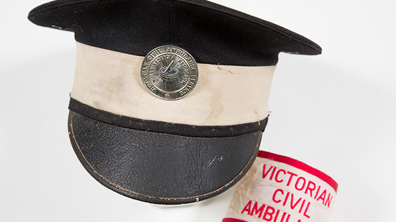 An old hat featuring the words 'Victorian Civil Ambulance Service' prominently displayed on the front.